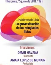 Detalle del cartel con la conferencia de mañana